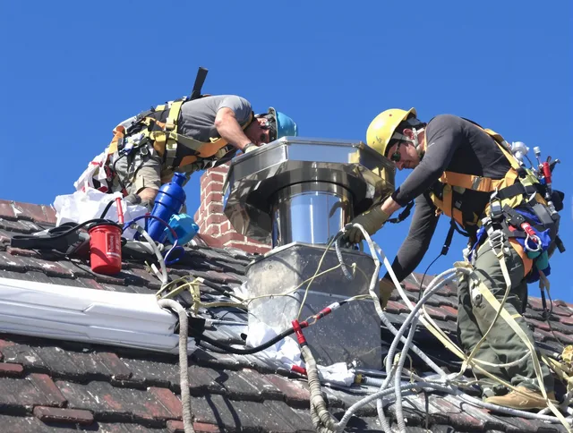 Protective chimney cap installed by Newington Chimney Sweep in Newington, CT